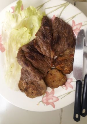 Una foto de Carne semifrita con rodajas de Berenjena