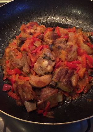 Una foto de Costillas de cerdo con tomatada