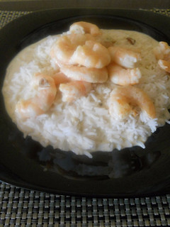 Una foto de Arroz con langostinos al curry
