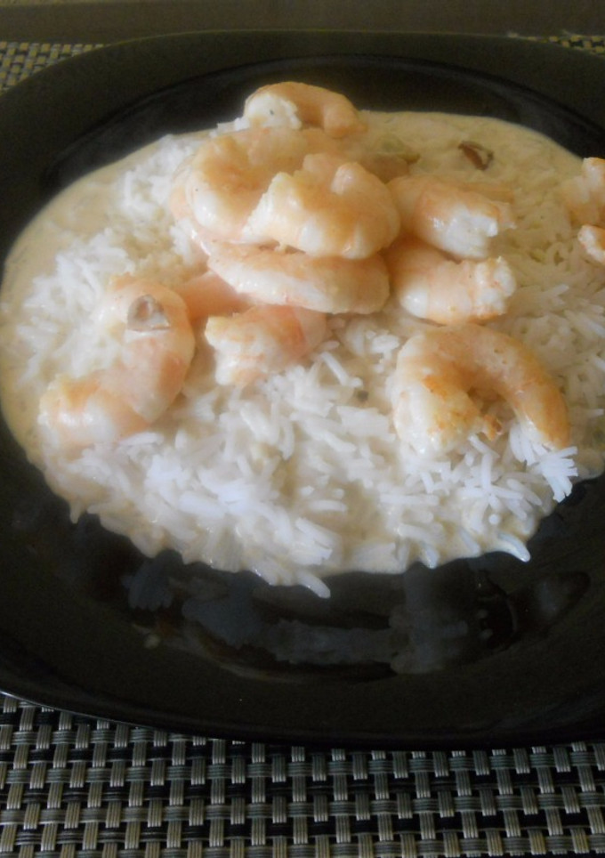 Una foto de Arroz con langostinos al curry
