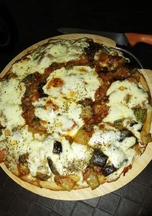 Una foto de Pizza de verduras