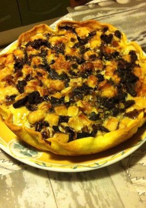 A picture of Chicken, Fennel, Black Mushroom, and Parmesan Tart.