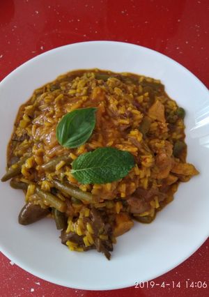 Una foto de Arroz con menudillos de pollo