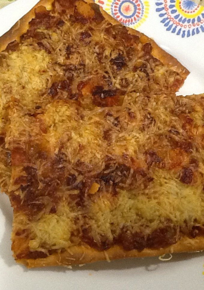 Una foto de Pizza de ajos tiernos