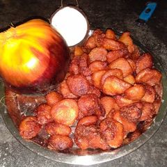TALER BORA (sugar plum fritters) A picture of TALER BORA (sugar plum fritters).