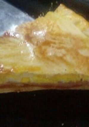 Una foto de Tarta de tomate, jamón, queso y huevos