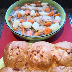 A picture of Healthy Vegetables Chicken Soup.🍜🐤🥕🍅🍄🍞.