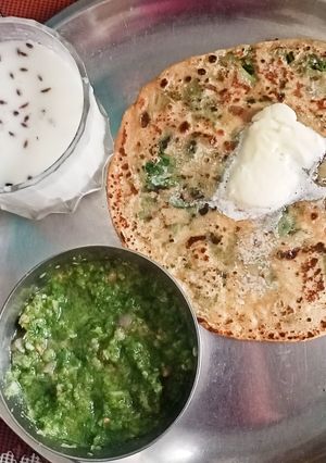 A picture of Spinach Paratha with Mint chutney & Buttermilk.