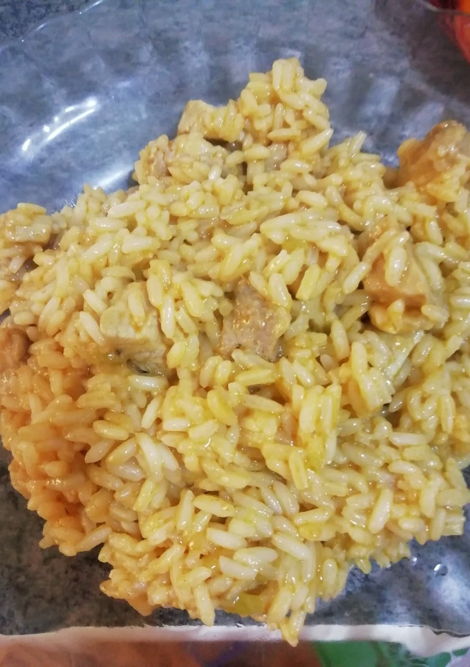 Una foto de Arroz con lomo y calabacín