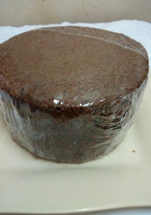 A picture of Chocolate cake with ground nuts.