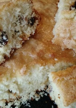 Una foto de Torta de crema, coco y frutos secos
