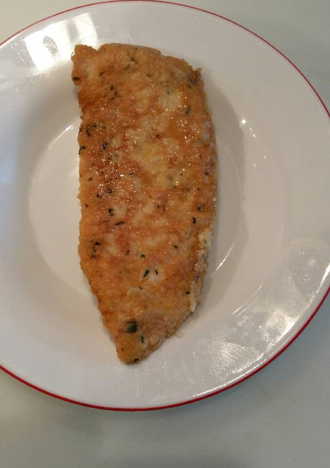 Una foto de Bistec de Pechuga de Pollo rebozada + Tortillita