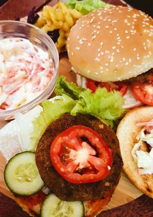 A picture of Shami Burger with Coleslaw,French Fries & Quice Lemonade.