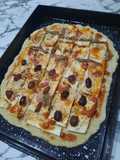 Pizza mitad anchoas, mitad olivas negras