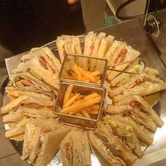 A picture of Chicken Sandwich with fires.