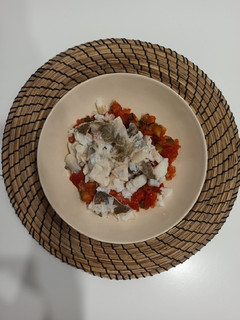 Una foto de Bacalao con pisto