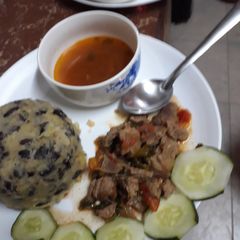 A picture of Mukimo, meat and soup.