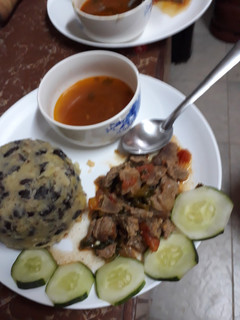 A picture of Mukimo, meat and soup.