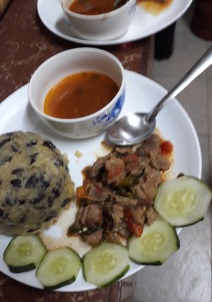 A picture of Mukimo, meat and soup.