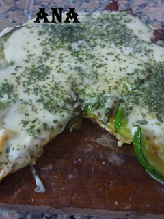 Una foto de Pizza de zapallitos en sartén