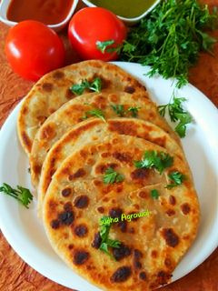 स्टफ्ड टोमैटो पराठा (Stuffed tomato paratha recipe in Hindi) रेसिपी मुख्य फोटो