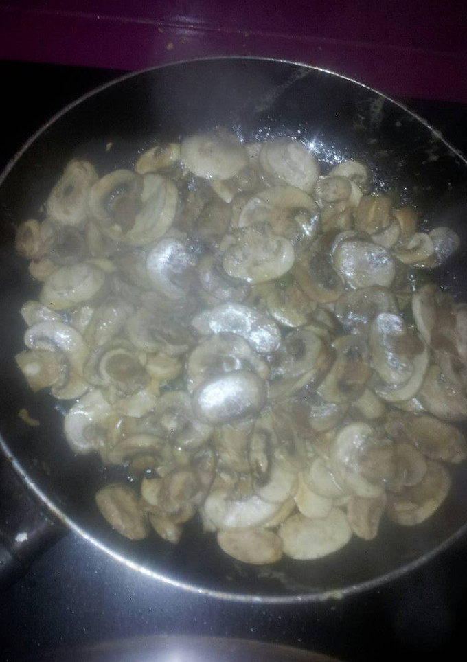 Una foto de Champiñones fritos