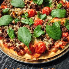 A picture of Beef, Tomato and Basil Pizza.