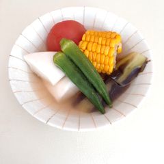 A picture of Oden with Summer Vegetables.