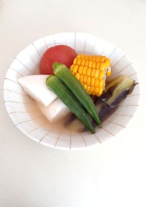 A picture of Oden with Summer Vegetables.