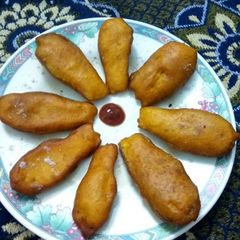 A picture of Crispy baiguni with a twist(brinjal fritters).