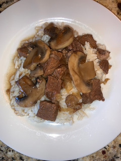 A picture of Beef Tips and Rice.