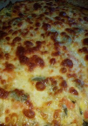 Una foto de Tarta de multicolor de zapallitos y queso