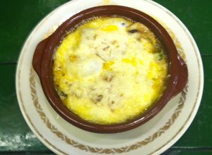Una foto de Huevos al plato con champignons