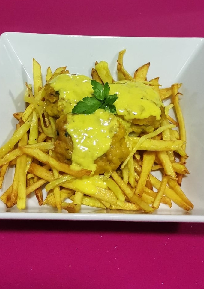 Una foto de Albóndigas de sepia en su salsa