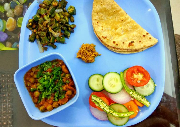 Lunch, chapati, salad, bhindi masala, soyabean matar ki sabzi