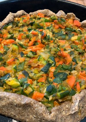 Una foto de Tarta de zapallito con masa integral casera