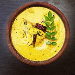 A picture of Kerala Manga Puliserry Mango Curry.