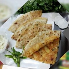 A picture of Potatoes Tandori Chicken Paratha.