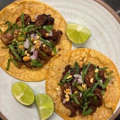 A picture of Spicy lemongrass pork tacos.