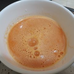 A picture of Apple and carrot purree.