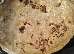 Una foto de Naan (pan indio)
