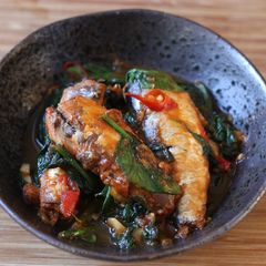 A picture of Stir fried tin of sardines with chilli spinach 🐟 🌶.