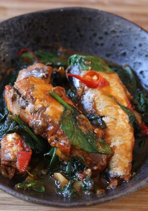A picture of Stir fried tin of sardines with chilli spinach 🐟 🌶.