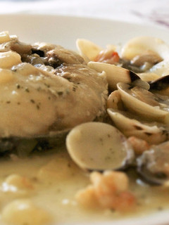 Una foto de Merluza en salsa verde