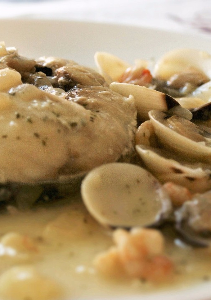 Una foto de Merluza en salsa verde