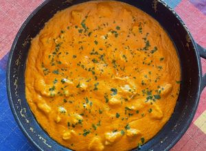 Una foto de Pollo tikka masala curry