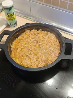 Una foto de Arroz con chipirones