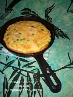 A picture of Thick Omelet with Butternut Squash and Peas.