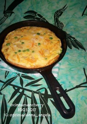 A picture of Thick Omelet with Butternut Squash and Peas.