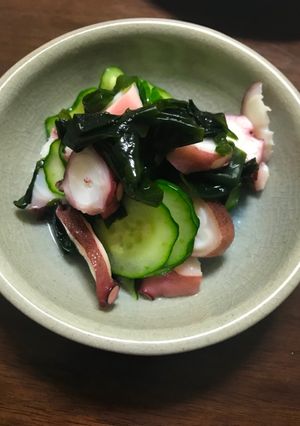 A picture of Cucumber and octopus  sunomono.